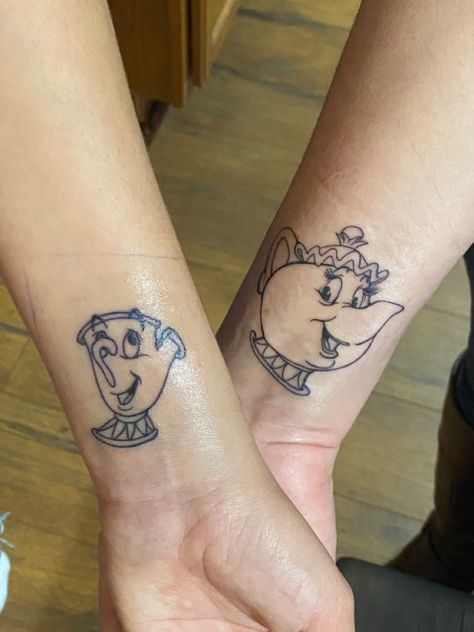 disney’s beauty & the beast chip & mrs. potts black ink wrist tattoo Chip And Mrs Potts Tattoo, Mrs Potts Tattoo, Mrs Potts And Chip Tattoo, Chip Tattoo, Mrs Potts And Chip, Beauty And The Beast Tattoo, Mrs Potts, Disney Tattoo, Disney Tattoos