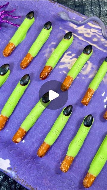 Genevieve LaMonaca on Instagram: "Witch Fingers🧙 Follow @chefgenevieve for 50 halloween recipes #halloweenfood #halloweeninspo #witchfingers #halloweenfoodideas

Ingredients:

10 pretzel rods
20 whole almonds (*see tip below)
10oz white melting wafers
1 tsp green gel food coloring
2 Tbsp powder sugar
1 tsp water 1 drop black food coloring

Directions:
Cut pretzel rods in half. Melt chocolate according to package directions (Melt for 45 seconds in the microwave then stir, then return to the microwave in 15 second increments stirring in between until fully melted. Do not overcook or the chocolate will clump)

Dip pretzel rods cut side down into chocolate. While still wet add an almond as the nail.

For the Black icing polish, mix powder sugar with water and black food coloring. Use a small Halloween Party Pretzels, Halloween Wafer Cookies, Witch Finger Pretzel Rods, Pretzel Witch Fingers, Mummy Pretzel Rods, Witches Fingers Pretzels, Halloween Sides For Party, Witch Finger Pretzels, Chocolate Dipped Pretzel Rods Halloween