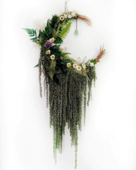 🍃🌸🌜🌲The Forest & The Meadow JUsT LiSTeD this enchanted wreath that's overflowing with real gorgeous greenery, ferns, flowers & especially this dark green hanging amaranthus!💚💚💚 Measures 12 inches wide 2 feet long . . . . . . . . ...#goddess #hedgewitch #earthmagic #earthwitch #witchy #witchywoman #witchyhome #homedecor #magicalhome #naturelover #driedflowerartist #crystalwreaths #crystalwreath #wreathmaker #artistsoninstagram #whimsical #explore #fyp #magic #rituals #witchcraft #witchcraft... Moon Wreath Moss, Weeping Wreaths, Witchy Wreaths, Green Hanging Amaranthus, Moon Wreaths, Rituals Witchcraft, Moss Wreath Diy, Hanging Amaranthus, Whimsical Wreath