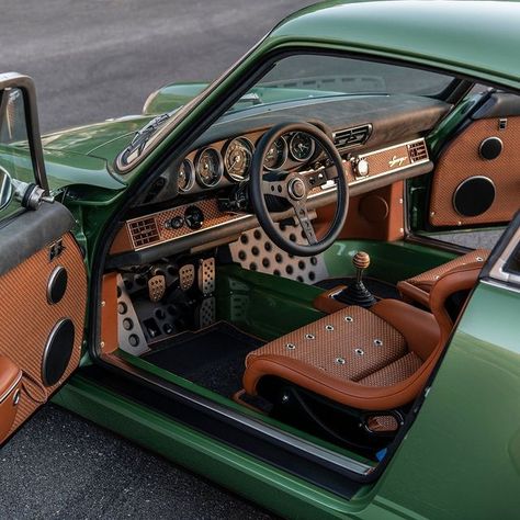 Singer Vehicle Design on Instagram: "Here’s the Redding commission.    Interior trimmed in Vivaldi with woven leather and nickel grommets.    Kauai Green Metallic exterior with ghosted stripes and Campfire Orange lettering.    #Singer #california #porsche" Porsche Singer Interior, Vintage Porsche Interior, Car Custom Interior, Orange Luxury Aesthetic, Orange Car Interior, Green Car Interior, E30 Interior, Miata Interior, Interior Car Aesthetic