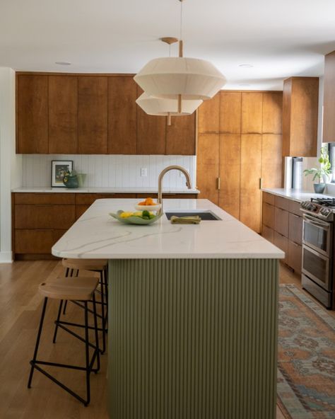 Parade of Homes Twin Cities | Absolutely in love with this reeded green island and beautiful wood cabinetry—the perfect blend of modern and organic elements. 🌿… | Instagram Reeded Wood, Mid Century Modern Kitchen Design, Curved Kitchen Island, Green Kitchen Island, Curved Kitchen, Mcm Kitchen, Modern Kitchen Remodel, Green Island, Organic Elements