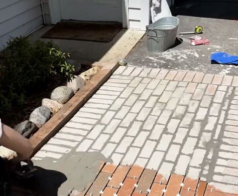 I wanted to add some curb appeal to our front steps, so I added some brick pavers over my existing concrete pathway...yes, that's right...OVER the existing sidewalk. Here is what our walkway looked like before...boring beat up concrete. First, I roughly laid out the brick pattern I would use. Then I mixed grout up in a bucket. Make sure to use exterior grade grout. Then I started to lay the grout with a thinly notched trowel. Then I put a small amount of grout on each brick and… Paver Sidewalk, Concrete Pathway, Brick Border, Epoxy Grout, Concrete Path, Concrete Cover, Concrete Walkway, Walkways Paths, Exterior Inspiration