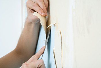 Image Source/Photodisc/GettyImages Remove Wallpaper Border, Remove Wallpaper Glue, How To Remove Wallpaper, Wallpaper Accent Wall Bathroom, Removing Old Wallpaper, Remove Wallpaper, Wallpaper Glue, Cleaning Painted Walls, Whatsapp Wallpaper