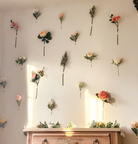 Full blog post detailing all the steps and materials for creating your own flower wall. Follow me on Instagram @kelseyhaverdesigns Bedroom Wall Flower Decor, Flower Decorations Bedroom, Dorm Flower Wall, Flower Decor On Wall, Flower Wall Aesthetic Bedroom, Flower On The Wall, Taped Flower Wall, Floral Garland Bedroom, Simple Room Wall Decor