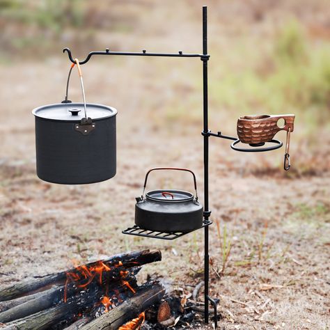 PRICES MAY VARY. 【DESIGN】The campfire grill grate can freely control the height of the grill, rotate flexibly, and control the temperature more easily. The baking tray is suitable for placing small pots, frying pans, etc. The hook arm is designed to hang pots, kettles, water bottles and more, adding fun to your camping life. 【PREMIUM QUALITY】The swivel campfire grill is made of high-strength welded steel and 100% hand-forged for durability. The high-quality baking paint process ensures sufficien Camping Supplies, Campfire Grill, Grill Stand, Bbq Camping, Hanging Pans, Shelf Hooks, Triangle Shelf, Camping Lamp, Closet Rod