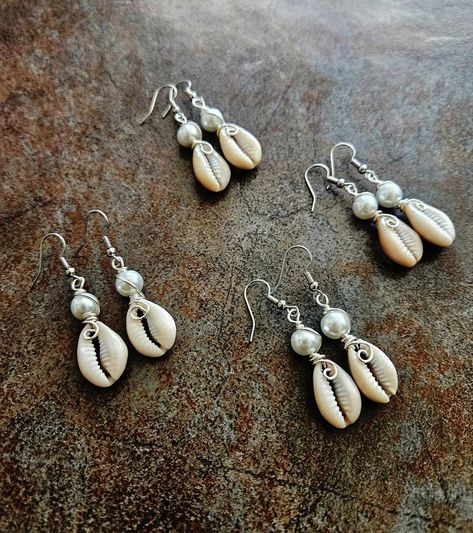 Cowrie Shell Earrings, Sea Shell Earrings, Silver Wire, Sea Shell Earrings - Etsy Wire Wrapped Shell Earrings, Puka Shell Earrings, How To Make Jewelry To Sell, Cowrie Jewelry, Cowrie Shell Earrings, African Inspired Jewelry, Sea Shell Earrings, Shell Ideas, Beaded Necklace Tutorial