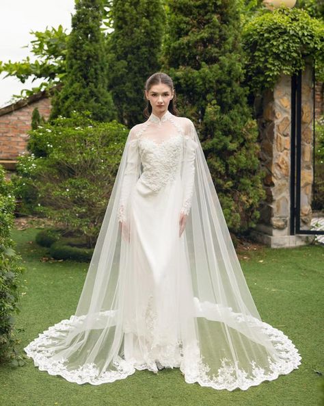 Draped in lace 🤍 Elevate your wedding ensemble with our stunning new bridal cape, designed to add a touch of luxury and elegance to your special day. Whether you're walking down the aisle in a classic wedding dress or a traditional ao dai, this exquisite piece is the perfect accessory to complete your look. Crafted with meticulous attention to detail, our bridal cape offers a blend of timeless sophistication and modern style. The delicate fabric drapes beautifully, providing an ethereal lay... Tulle Cape, Lace Cape, Bridal Cape, Dream Dresses, Classic Wedding Dress, Light Ivory, Soft Tulle, Bridal Robes, Tulle Lace