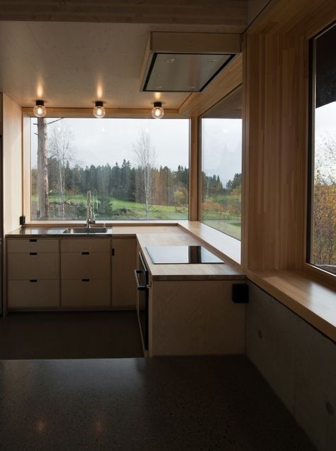 Cabin at Rones by Sanden+Hodnekvam Arkitekter is an austere shelter of wood and concrete that looks out over Norwegian fjords Trondheim, L Shaped Kitchen, Norwegian Architecture, Plywood Kitchen, Concrete House, Wooden Windows, Small Cabin, Polished Concrete, Küchen Design