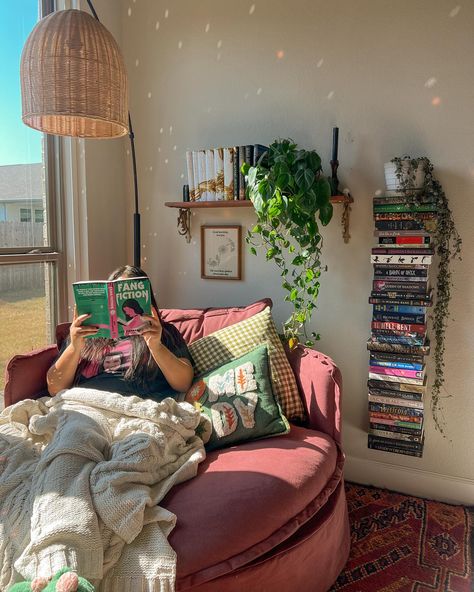 the perfect reading corner doesn’t exi- 🧚🏽‍♀️🍂🎃☕️ guys I love this cozy corner. It’s the perfect size for lounging and reading and naps according to my daughter 😂 I got the @sixpennyhome round daybed in the color summer plum and it’s the perfect pop of color in my room. Thanks to everyone who voted! 🥹 and thank you sixpenny for sending my dream chair over! 💟 update: I am currently in my vampire era and I am enjoying fang fiction! I finished so thirsty & had an amazing time. I have to rea... Cozy Room Winter Aesthetic, Home Reading Area, Hammock Reading Nook, Dorm Reading Nook, Cozy Daybed Ideas, House Inspo Cozy, Day Bed Reading Nook, Cozy Corner Chair Ideas, Hangout Corner In Bedroom