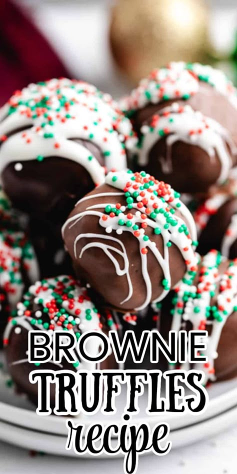 Christmas Brownie Truffles are the ultimate holiday treats! These fudgy, rich truffles are perfect for chocolate lovers. With their brownie centers and chocolate coatings, they'll be favorites for kids and adults alike! Homemade Truffles | Holiday Cookies | Holiday Baking | Christmas Desserts | Candy Recipes Homemade | Homemade Candies | Dessert Recipes Easy | Just Desserts | Baking Recipes | Cake Pop Recipes | Christmas Truffles Recipe, Baking Recipes Cake, Brownie Truffles Recipe, Cake Pop Recipes, Christmas No Bake Treats, Christmas Brownie, Truffle Recipe Christmas, Holiday Brownies, Brownie Truffles