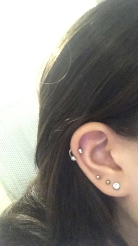 Helix and triple lobe, ear piercings #earpiercings Triple Stud Piercing, Lobe Piercings Triple, Outer Ear Piercing, Lower Helix Piercing Studs, Triple Stacked Lobe Piercing, Ear Lobe Piercings Triple, Triple Lobe And Helix Piercing, Triple Lobe Piercing Ideas, Triple Lobe Piercing