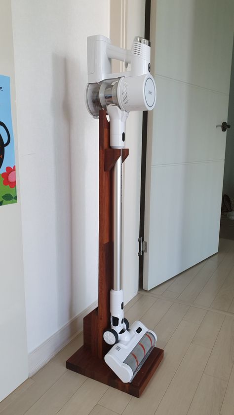 #woodstand #woodstand diy #vacuumcleaner woodstand Stick Vacuum Storage, Dyson Storage, Vacuum Cleaner Storage, Electrician Wiring, Dyson Cordless, Apartment Hacks, Portable Vacuum Cleaner, Vacuum Storage, Wooden Rack