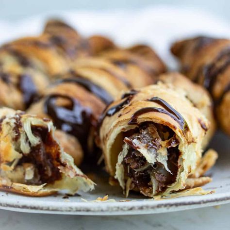 30 Minute Puff Pastry Chocolate Croissants Recipe (pain au chocolate) • A Weekend Cook® Chocolate Crossiant Recipes, Panera Chocolate Croissant Recipe, Breakfast Ideas Pastries, Chocolate Croissant Breakfast Bake, Croissant Recipe Chocolate, Chocolate Breakfast Pastry, Chocolate Croissant Recipe Puff Pastry, Chocolate Puff Pastry Dessert, Chocolate Breakfast Ideas