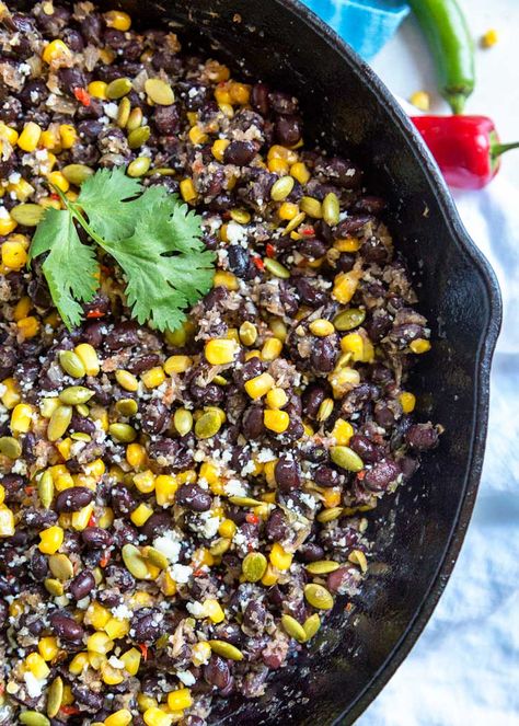 These Mexican Beans and Corn (Frijoles con Elote) get a flavor boost from a mixture called a sofrito that’s made of chiles, onion and garlic dry roasted then blended together. Top with cheese and pumpkin seeds and it's a fantastic side dish. #Mexican #beans #corn #side Corn And Black Bean Side Dishes, Black Bean And Corn Side Dish, Mexican Corn And Black Beans, Black Beans And Corn Side, Recipes With Black Beans And Corn, Black Bean And Corn Enchiladas, Healthy Refried Black Beans, Black Beans And Corn Quesadillas, Vegetarian Beans