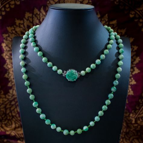 A remarkable antique Victorian jade bead necklace measuring an impressive 45 inches. Each jade bead is glossy and smooth with pale green colouring and natural patterning showing through. The beads are knotted together on a length of green rope and fitted with a secure silver box clasp at the end adorned with a large leaf motif on top, also carved from jade. It’s a magnificent piece, all in excellent condition and can be worn as one long necklace that hangs at the stomach or looped twice arou... Jade Bead Necklace, Tibetan Jewelry, Leaf Motif, Box Clasp, Silver Box, Jade Beads, East Asia, Antique Jewellery, Jade Green