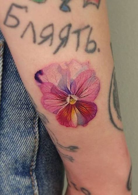 Pansy Tattoo Color, Pansy Tattoo Design, Purple Flowers Tattoo, Flower Tattoo Colorful, Pansy Tattoo, Iris Flower Tattoo, Colorful Flower Tattoo, Purple Tattoos, Plant Tattoo