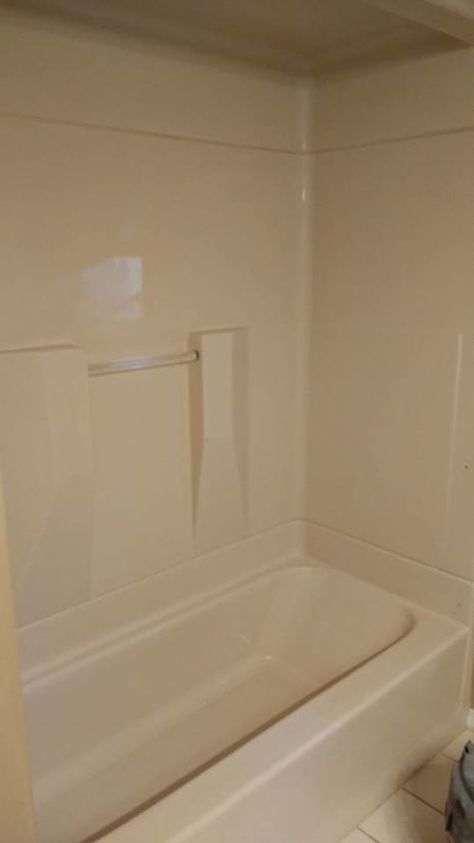 Do THIS one thing to your boring tub to make it look so much better! You'll be so happy you saw this! 90s Bathroom, Guest Bathroom Remodel, Small Tub, Old Bathroom, Tub Surround, Wall Shelves Design, Tub Shower Combo, Bathroom Update, Small Budget