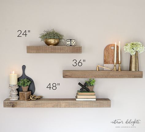 These unique and custom built shelves will be a beautiful and timeless addition to your home. Use them to hold decorative accents and create an eye catching vignette in your home. These shelves are uniquely built here in the USA . Each shelf is sold separately and shipped from a separate location from the rest of your order. Please expect two weeks for your order to ship. LARGE: 48" long x 3" tall x 5.5" deep MEDIUM: 36" long x 3" tall x 5.5" deep SMALL: 24" long x 3" tall x 5.5" deep SHELVES AR 3 Wall Shelves, Decor For Office Shelves, Floating Shelves On Big Wall, Floating Shelves For Plants Living Room, Floating Shelf Configuration, Styling Shelf Living Room, Floating Shelf Decorating Ideas, Hanging 3 Shelves Layout, Living Room Wood Shelves