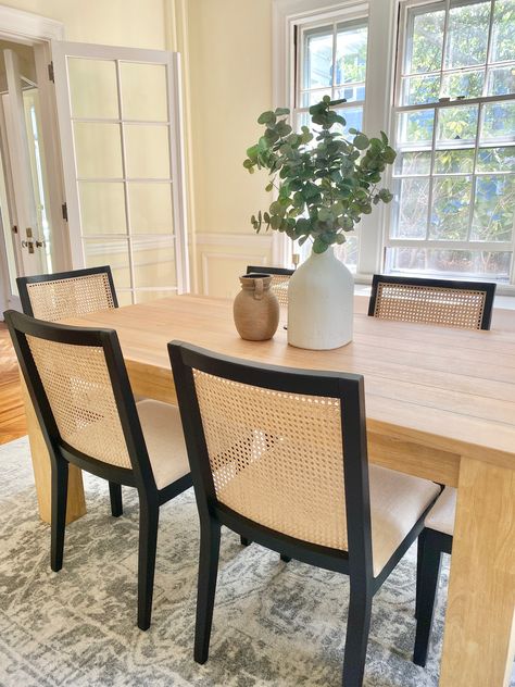 Dining Room 4 Seater, Dining Room With Cane Chairs, Cane Dining Chairs And Table, Dining Room Rattan Chairs, Diy Rattan Dining Chairs, White Oak Table With Black Chairs, Dining Room With Rattan Chairs, Wicker Back Dining Chairs, Six Seater Dining Table For Small Space