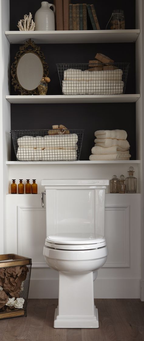 love the bath shelves and dark wall color contrast Organizing With Baskets, Makeover Kamar Mandi, Bilik Air, Decor Ikea, Bad Inspiration, Toilet Storage, Bathroom Redo, Distressed Furniture, Tiny Bathroom