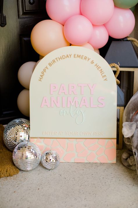 Planning, styling and balloons: @thecollectivecreativeco Photography: @isabellaalexphoto Florals and backdrops: @nataliegdesigns Table setting and favor backdrops: @picnic_and_petal Balloons: @my_balloon_edit Party ware and jelly bags: @loveofcharacter Laser cut goods: @kulgra Backdrop acrylic: @light_crafted_by_shangamble Bounce house: @lermas_eventrentals Soft play: @lunasoftplay Balloon twisting: @fabulousfacesbynallely Cake and cupcakes: @tiersofjoycd Sunnies: @shopbellemaelou Two Wild Balloons, Party Animal Backdrop, Adopt An Animal Party, Adopt An Animal, Party Animal Birthday, Double Birthday Parties, Jelly Bags, Wild Birthday Party, Rodeo Birthday