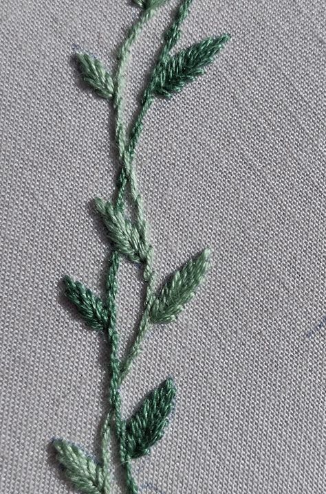 Hand embroidered interlacing vines with leaves Embroidered Leaf Pattern, Vines Embroidery Pattern, Oak Leaf Embroidery Pattern, Simple Vine Embroidery, Flower And Leaves Embroidery, Embroidered Ivy Leaves, Embroidered Vines And Leaves, Embroidered Leaves Simple, Hand Embroidery Vines