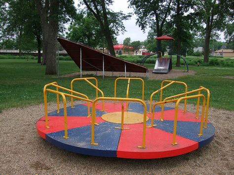 Early 1960's playground equipment. It's a wonder we survived recess. All of our playground equipment was installed on blacktop! No sand, grass, or wood chips. Merry Go Round Playground, School Playground Equipment, Old School Toys, School Playground, Childhood Days, Play Equipment, Vintage Memory, Playground Equipment, Kids Ride On