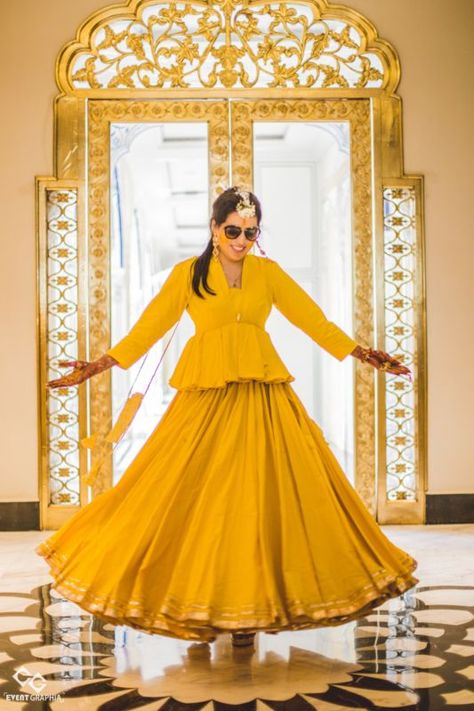 Peplum Blouses & Why You Need To Have Them In Your Bridal Trousseau! Unique Haldi Outfits For Bride Yellow, Pithi Outfit Brides Yellow, Haldi Rasam Dress, Peplon Blouse And Skirt, Pithi Outfit Yellow, Haldi Gown, Pithi Outfit, Haldi Ceremony Outfit For Bride Unique, Unique Haldi Outfits For Bride