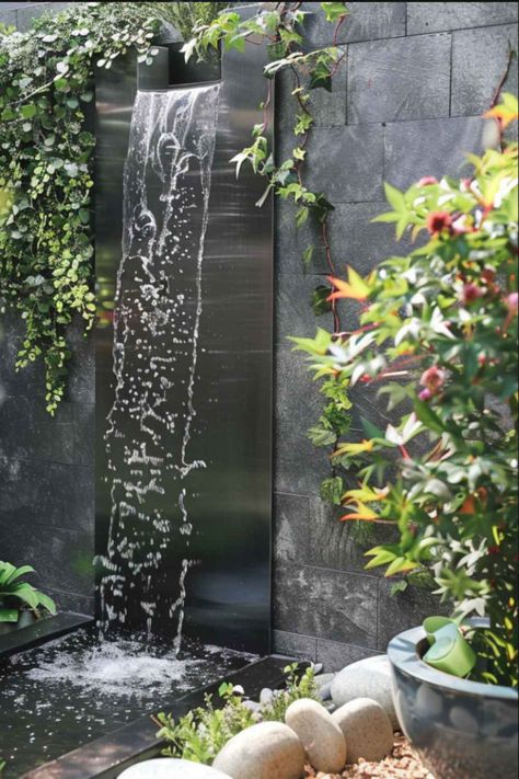 Modern metal garden fountain with cascading water, highlighting the history and evolution of metal fountains. Modern Fountain, Outdoor Fountains, Home Gardens, Fountain Design, Waterfalls Backyard, Tabletop Fountain, Quirky Illustration, Indoor Fountain, Beautiful Water