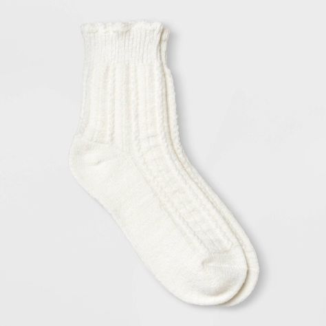 Keep your feet warm with the Women's Scalloped Edge Pointelle Supersoft Short Crew Boot Socks - Universal Thread™ 4-10. These soft socks are made from blended midweight fabric that ensure maximum comfort and warmth. With ribbed knit cuffs and a scalloped edge design, they provide a secure, snug fit that stays in place all day. Perfect for lounging at home or for pairing with boots, these essential socks are a seasonless staple for every wardrobe. Universal Thread™: Found exclusively at Target. Target Christmas Socks, Cute Winter Socks, Fatface Socks, Saving List, Socks Png, Essential Socks, White Crew Socks, Sock Collection, Soft Socks