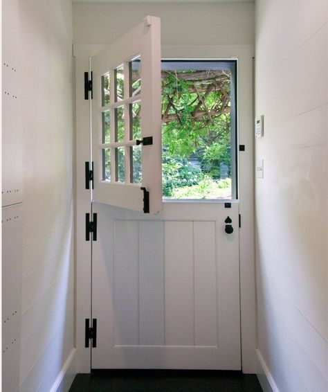 This traditional Dutch door with a paned top half has four sturdy hinges, a heavy-duty Dutch door bolt, a classic knob with lock, and a deadbolt on the upper half. Pintu Interior, Barn Door Hinges, Half Doors, Stable Door, Dutch Door, Open Door, Kitchen Doors, Interior Barn Doors, Back Doors