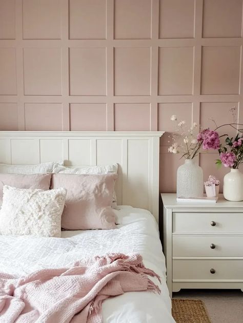 A bedroom painted in  SULKING PINK ROOM by Farrow & Balls. White wooden bed with lace pillows and a white wooden night stand with ceramic flower vase. A truly feminine bedroom! Benjamin Moore Rose Bisque Bedroom, Behr Rosewater Paint, Blush And Taupe Bedroom, Sherwin Williams Neutral Pink, Light Dusty Rose Paint Color, Vintage Tea Rose Paint Behr Nursery, Dusty Rose Wall Color, Demure Sherwin Williams, Sherman Williams Pink Colors