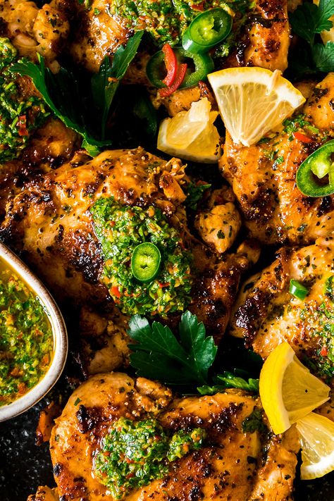 Chicken Thighs with Chimichurri Sauce served on a black plate Chimichurri Chicken Thighs, Chimichurri Chicken, Pork Medallions, Beef Strips, Chilli Peppers, Chimichurri Sauce, Perfect Dinner, Dinner Inspiration, Roasted Meat