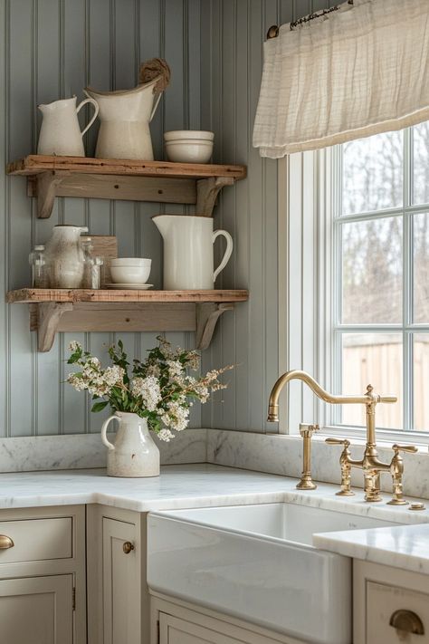 Embrace rustic charm with the latest kitchen design featuring vintage shelving and warm gold accents. Ideal for creating a cozy, farmhouse vibe! #KitchenDecor #ModernRustic #HomeTrends Farm Chic House, Cute Farmhouse Interior Design, French Farmhouse Kitchen Backsplash, Neutral Vintage Kitchen, Cozy Chic Kitchen, French Style Farmhouse, Small Cottage Home Interior, Vintage Aesthetic House Interior, Cottage Vibe Kitchen