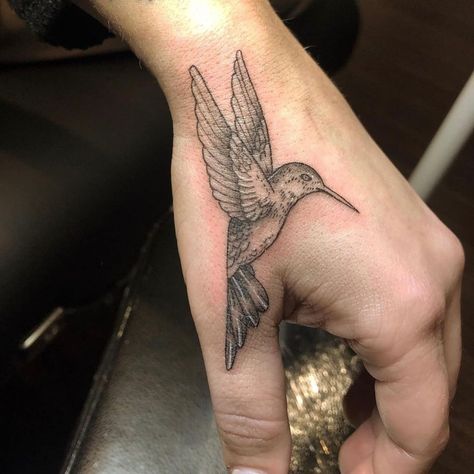 Hearts & Hands Tattoo on Instagram: “Fine line hummingbird done by Hadley! @smutattoos 🪶 #heartsandhandstattoo #smutattoos #finelinetattoo #handtattoo #blacktattoo…” Bird Tattoo Men Hand, Hummingbird Tattoo On Chest, Men Hummingbird Tattoo, Hummingbird Tattoo On Hand, Humming Bird Hand Tattoo, Men’s Hummingbird Tattoo, Male Hummingbird Tattoo, Small Hummingbird Tattoo Black, Humming Bird Tattoo For Men