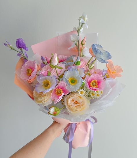 this was one of the first big bouquets we worked when our colourful poppy bouquet started to become popular and on avg it took me 3-4 hours to get one right. One of my biggest advice for aspiring florists is to practice as much as you can 💗🌷 Small Whimsical Bouquet, Unique Bouquet Ideas, Poppies Bouquet, Poppies Flower, Flower Shop Decor, Poppy Bouquet, Pretty Bouquet, Bouquet Arrangement, Become Popular