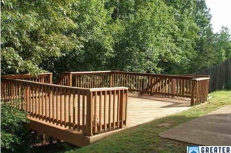 Sloped back yard solution! Decks On Hillside Sloped Yard, Sloped Backyard Ideas, Sloping Backyard, Hillside Deck, Budget Landscaping, Backyard Ideas On A Budget, Sloped Yard, Sloped Backyard, Hillside Landscaping