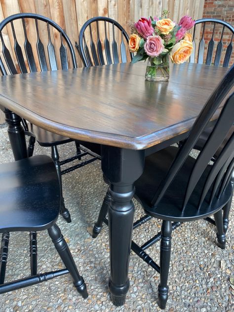 Classic black chairs and table legs with a walnut stained top Black Farmhouse Table Dining Room, Kitchen Table Black Legs Wood Top, Stained Table With Black Chairs, Repainted Dining Table, Table Black Legs Wood Top, Wood Top Black Legs Table, Diy Black Dining Table, Black Leg Dining Table, Black Kitchen Table Chairs