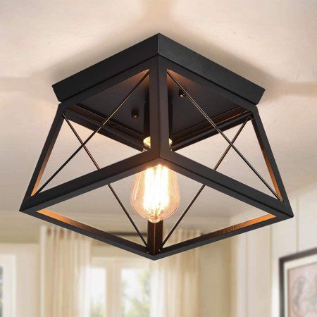 Garwarm particular style flush mount ceiling light decorated the rectangle frame staggered composition and metal canopy, creating a comfortable atmosphere for your home. Made of high-quality metal, made by pressing, grinding and painting, it has fine workmanship. The Black ceiling light's farmhouse-inspired design is ideal for any hallway, kitchen, sitting room, or foyer in coastal, craftsman, farmhouse, rustic, urban industrial, and vintage electric interiors. Size: ‎10.63"L x 10.63"W x 7.09"H. Cage Light Fixture, Island Kitchens, Rustic Ceiling Lights, Kitchens Ideas, Black Ceiling Lighting, Decorating Kitchen, Rustic Ceiling, Farmhouse Light Fixtures, Cage Light