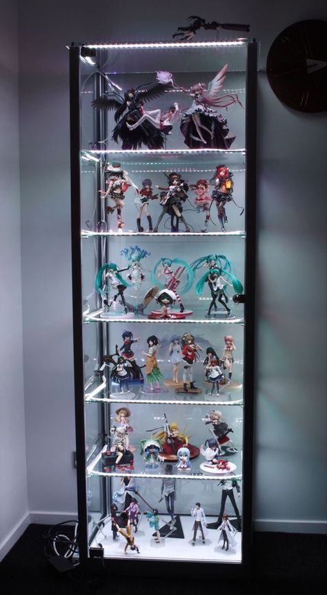 Anime Display Case, Figure Room Ideas, Anime Figure Display Ideas, Figurine Collection Display, Figure Collection Display, Anime Figures Collection Display, Cosplay Room, Anime Room Ideas, Book And Bed