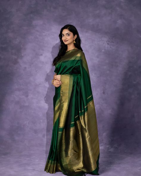 Leila | The Dark Beauty This bottle green Kanjeevaram silk saree has bavanchi border and zari checks interlocked with special double korvai technique. [Summer Collection, Kanchipuram silk saree, Tulsi Silks, Tulsi, Tulsi Weaves, Kanjeevaram Pattu, Handwoven sarees, Kanchipuram, Pure Silk Sarees, Handwoven silk saree, Trending silk saree, bridal silk saree] Bottle Green Silk Saree, Dark Green Silk Saree, Dark Green Saree, Saree Trending, Silk Saree Bridal, Tulsi Silks, Green Silk Saree, Kanjeevaram Silk Saree, Bridal Silk Saree