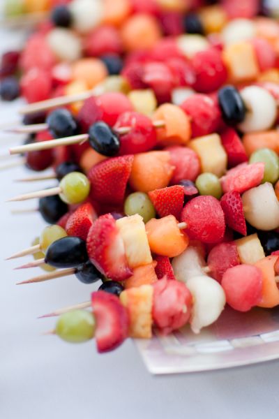 The perfect party food should have great presentation, be easy to eat and, of course, taste delicious! We’ve found that if it’s bite-size or served on a stick, it’ll likely be a crowd-pleaser, and bonus points go to anything covered in rainbow sprinkles. Get inspired by 25 of our favorite ideas for party foods, including […] Summer Wedding Food, Best Party Snacks, Bridal Shower Menu, Summer Wedding Diy, Graduation Party Foods, Wedding Appetizers, Wedding Themes Summer, Fruit Skewers, Summer Bridal Showers