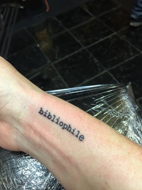 Bibliophile tattoo Tattoos For Authors, Readers Tattoo, Bibliophile Tattoo, Reader Tattoos, Author Tattoo, Reader Tattoo Ideas, Tattoos For Readers, Wrist Tattoos Quotes, Literature Tattoos