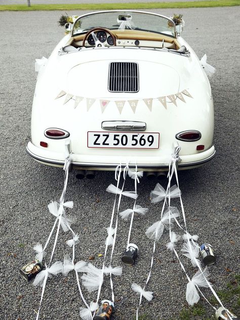 Just Married! But Why the Tin Cans on the Getaway Car? Wedding Getaway Car, Cars Decorations, Wedding Getaway, Event Planning Guide, Car Wedding, Just Married Car, Pernille Teisbaek, Wedding Car Decorations, Wedding Transportation