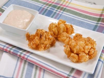 Onion Blossom Recipe, Onion Blossom, Blooming Onion Recipes, Cipollini Onions, Bloomin Onion, Blooming Onion, Food Network Canada, Onion Recipes, Cooking Channel