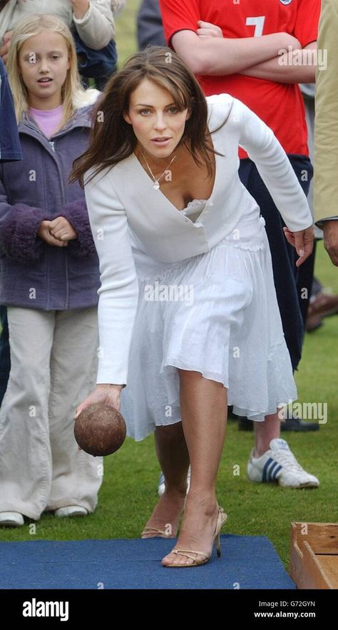 Download this stock image: Elizabeth Hurley tries skittles after opening Ampney Crusis Fete. - G72GYN from Alamy's library of millions of high resolution stock photos, illustrations and vectors. Elisabeth Hurley, Elizabeth Hurley, Image Processing, Celebrity Entertainment, Your Image, Beautiful People, High Resolution, Stock Images, Im Not Perfect