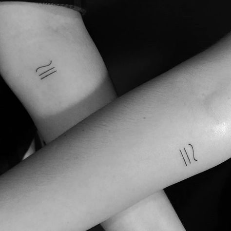 16 Fine Line Tattoos For Families That Will Perfectly Represent Your Bond & Love Symbol Representing Family, Tattoo That Means Family, 3 Daughter Tattoos For Mom, Family Tattoo Symbol, Symbols That Mean Love, Small Tattoo Ideas Fine Line, Fine Line Tattoos For Moms With Kids, Minimal Sibling Tattoo, Tattoos That Mean Family