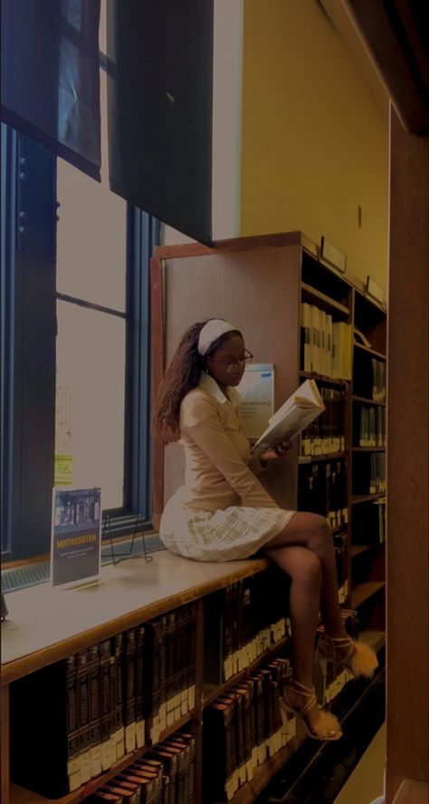 darkskin black woman reading in a library wearing a skirt, heels , and button up shirt Book Aesthetic Black Woman, Black Poet Aesthetic, School Aesthetic Black Women, Black Librarian Aesthetic, Black Church Girl Aesthetic, Black College Girl Aesthetic Studying, Study Aesthetic Black Women, Artsy Black Girls Aesthetic, Black Writer Aesthetic