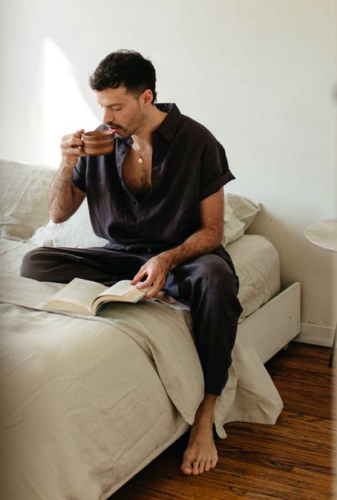 Man Journaling, Men Journaling, Apartment Photoshoot, 1950s Apartment, Bedroom Photoshoot, Sitting On Bed, Man Bedroom, Apartment In Nyc, Home Relaxing