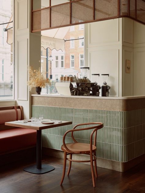 Sloane Street Deli redesigned to be "classic neighbourhood spot" Japanese Tile, Parisian Bistro, White Molding, Booth Seating, Bentwood Chairs, Cafe Interior Design, Green Tile, Table And Chair, Bistro Table